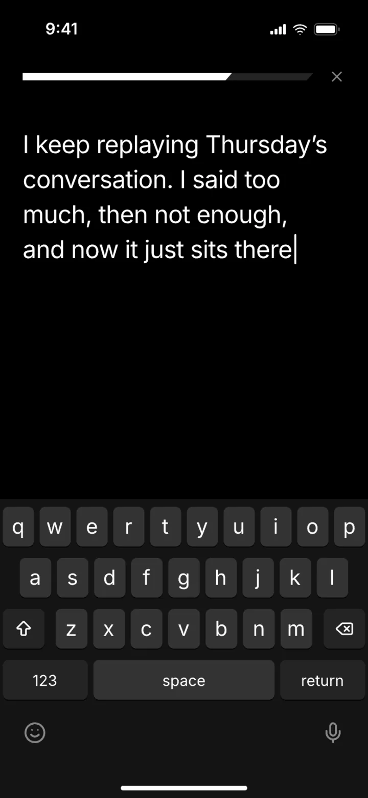 BackBack writing screen: a dark page with a few typed sentences and the keyboard open.